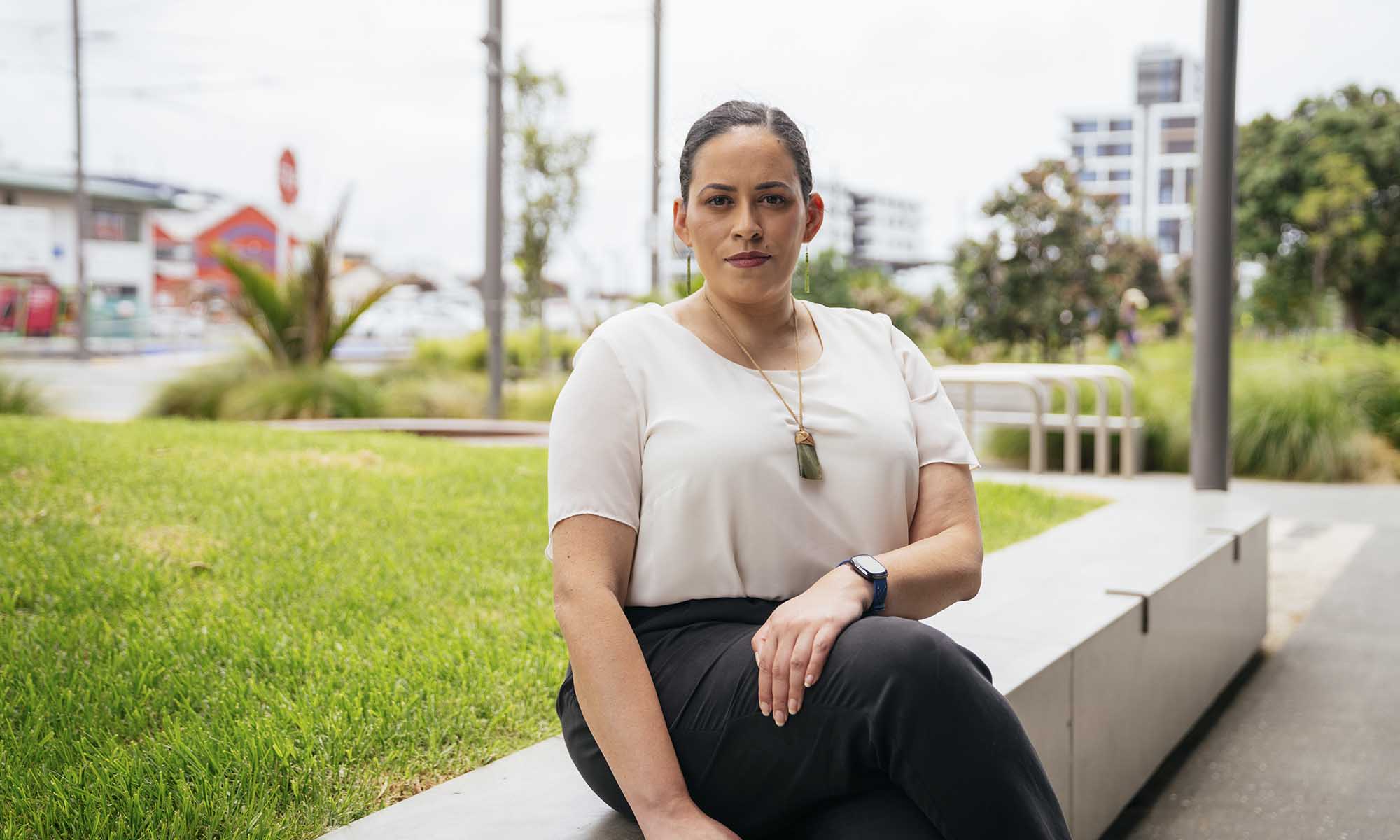 Datacom's Denise Carter-Bennett sitting on a bench