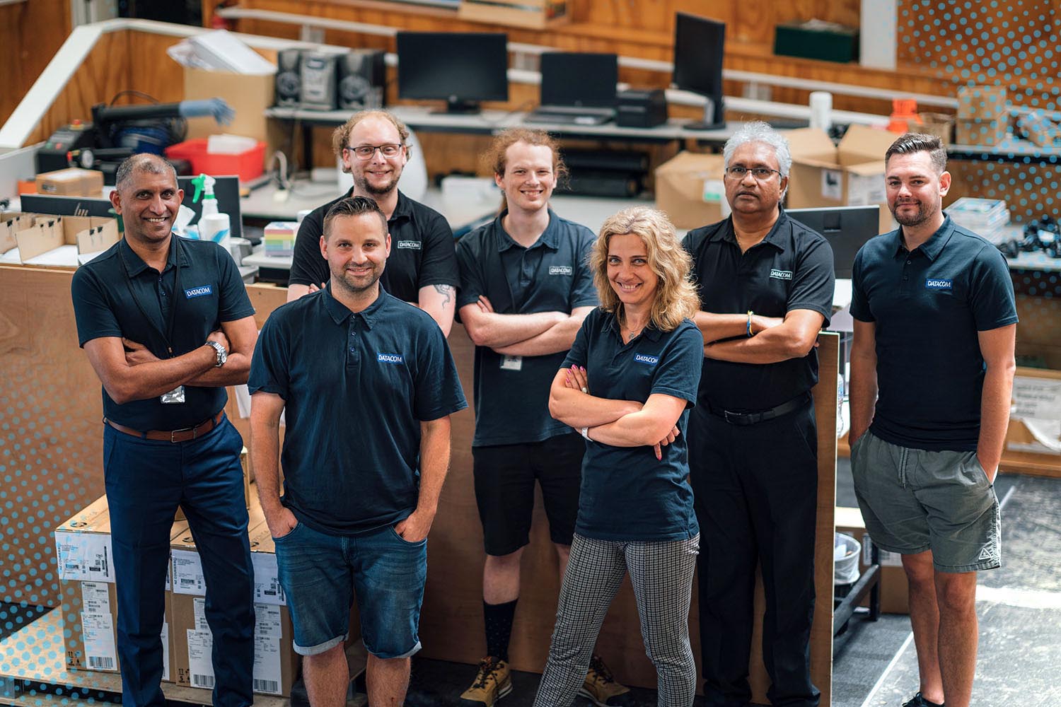 A team photo of Datacom warehouse workers