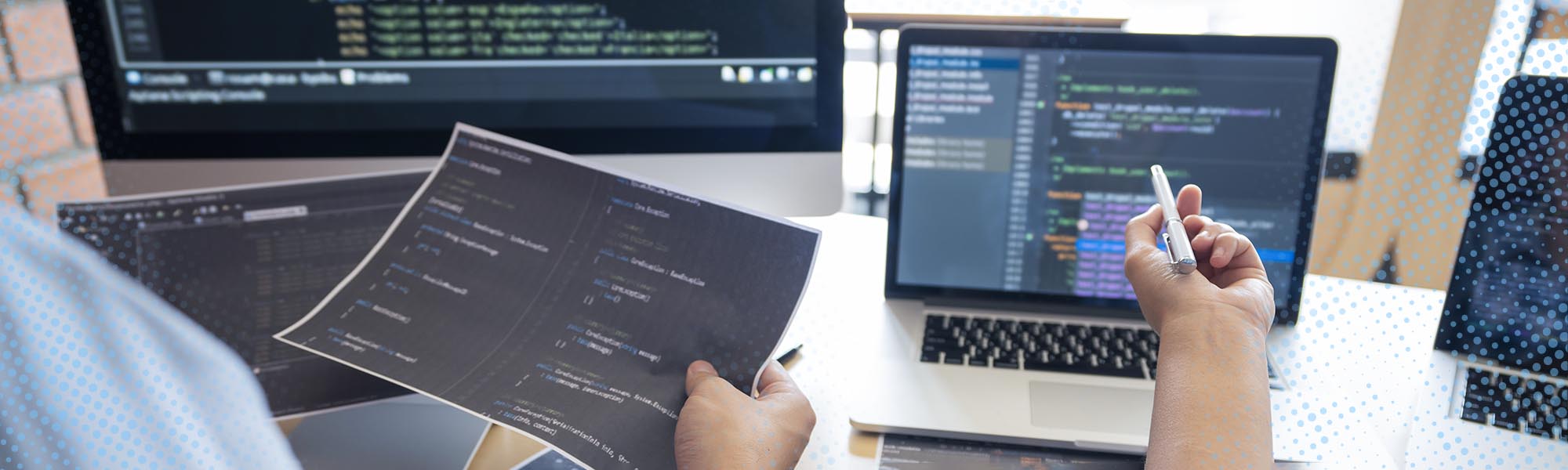 Two people discussing lines of code