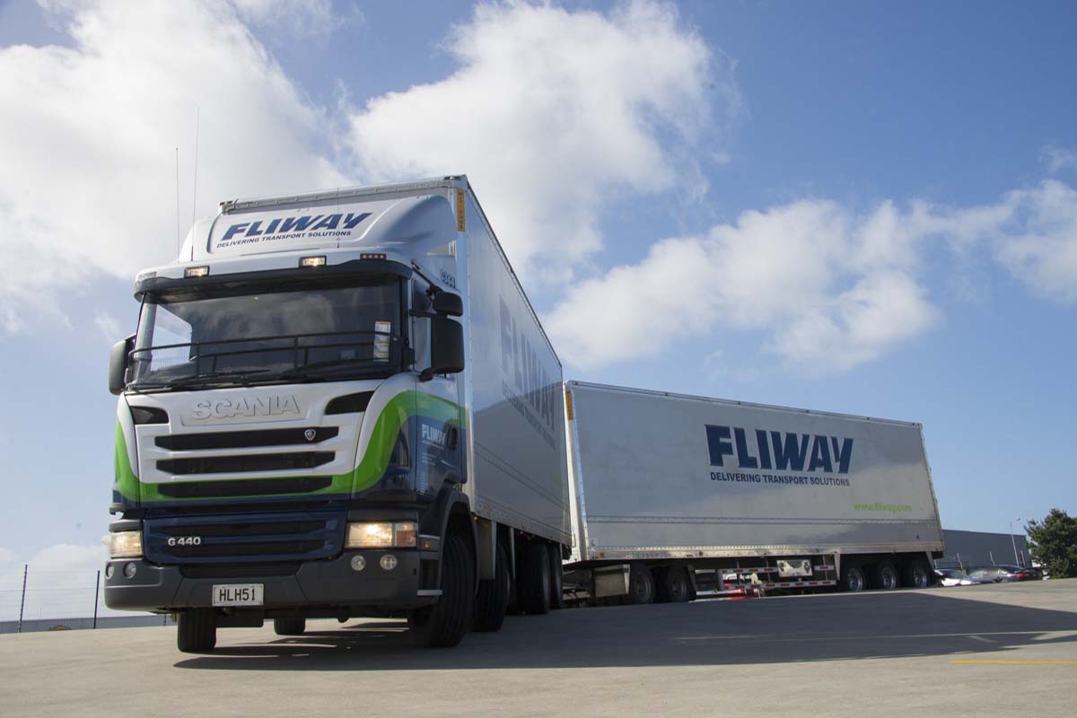 A Fliway truck with two trailers attached