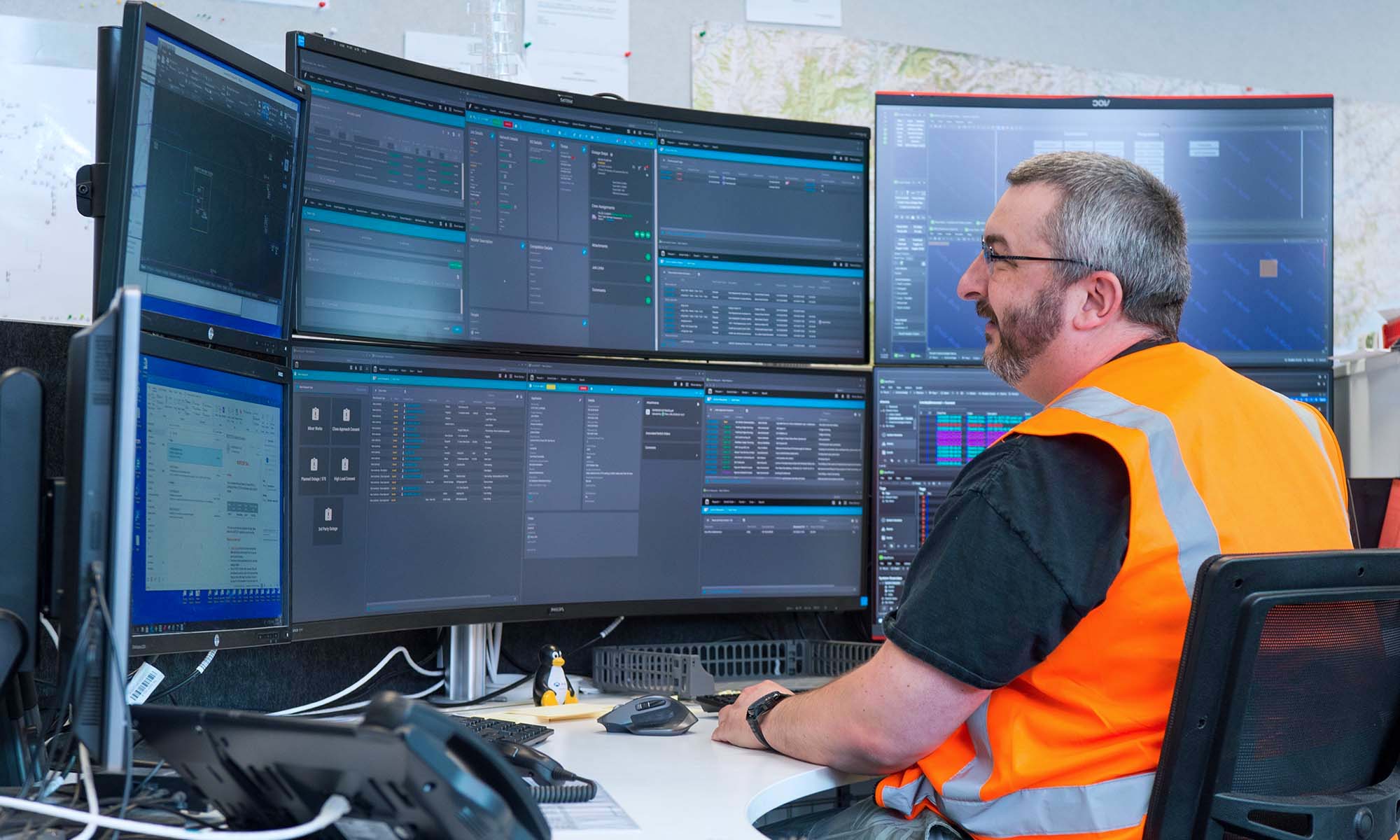 MainPower employee analysing data